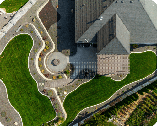 Aerial drone photograph of a residential property and landscaping